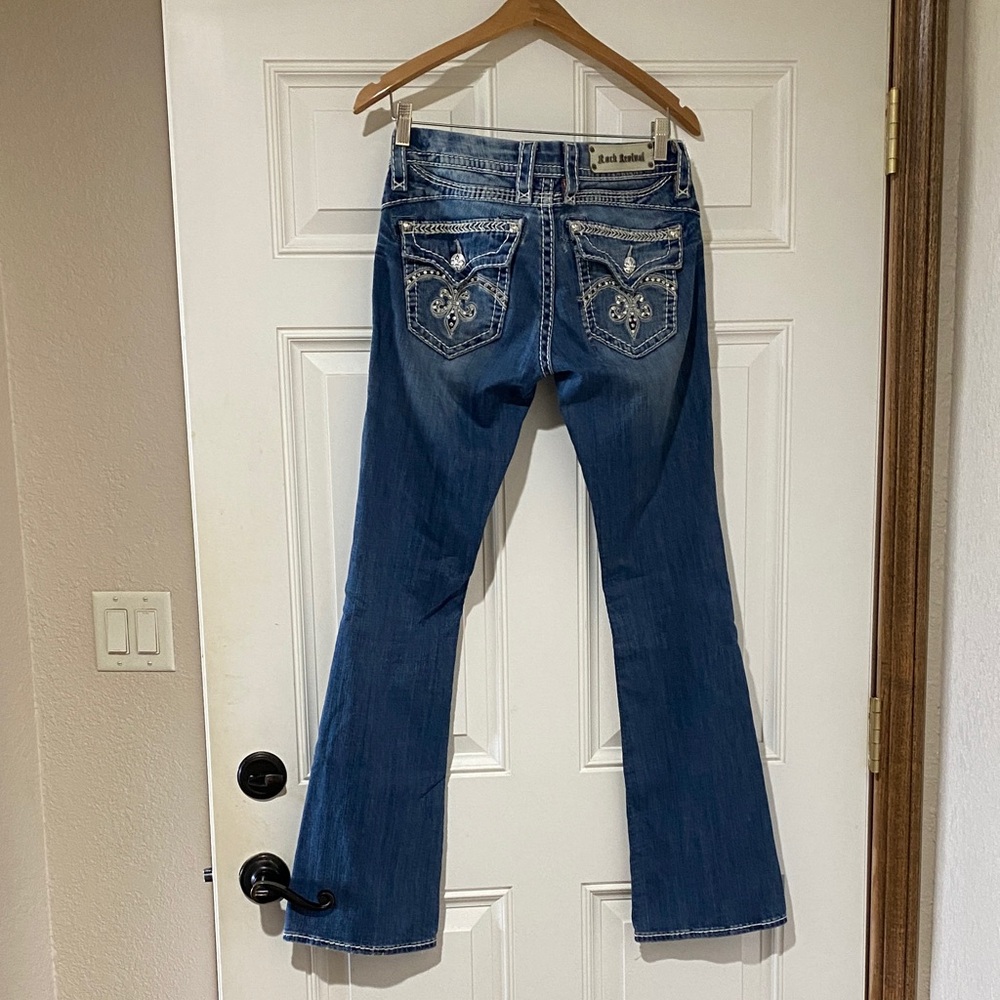 Rock Revival Women's Medium Blue Boot Cut Jeans with Embroidered Fleur-de-Lis